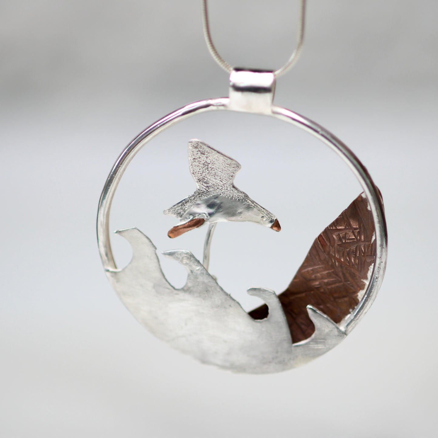 Kinetic puffin necklace - moving jewellery